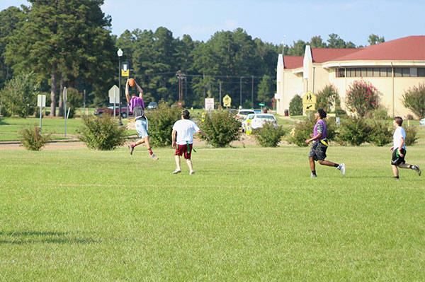 students playing flag football