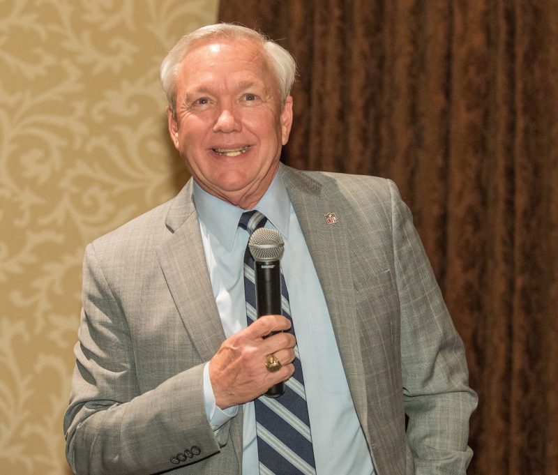 white male with microphone