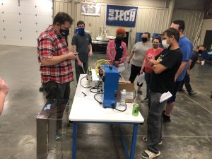 students working on machines