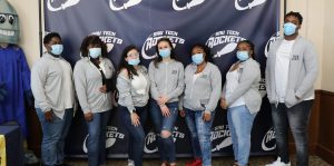group of students posing and wearing masks