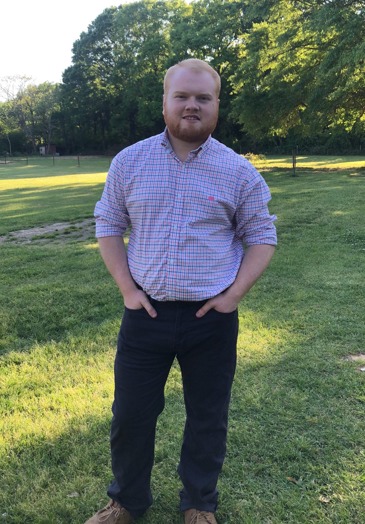 young man in a purple shirt