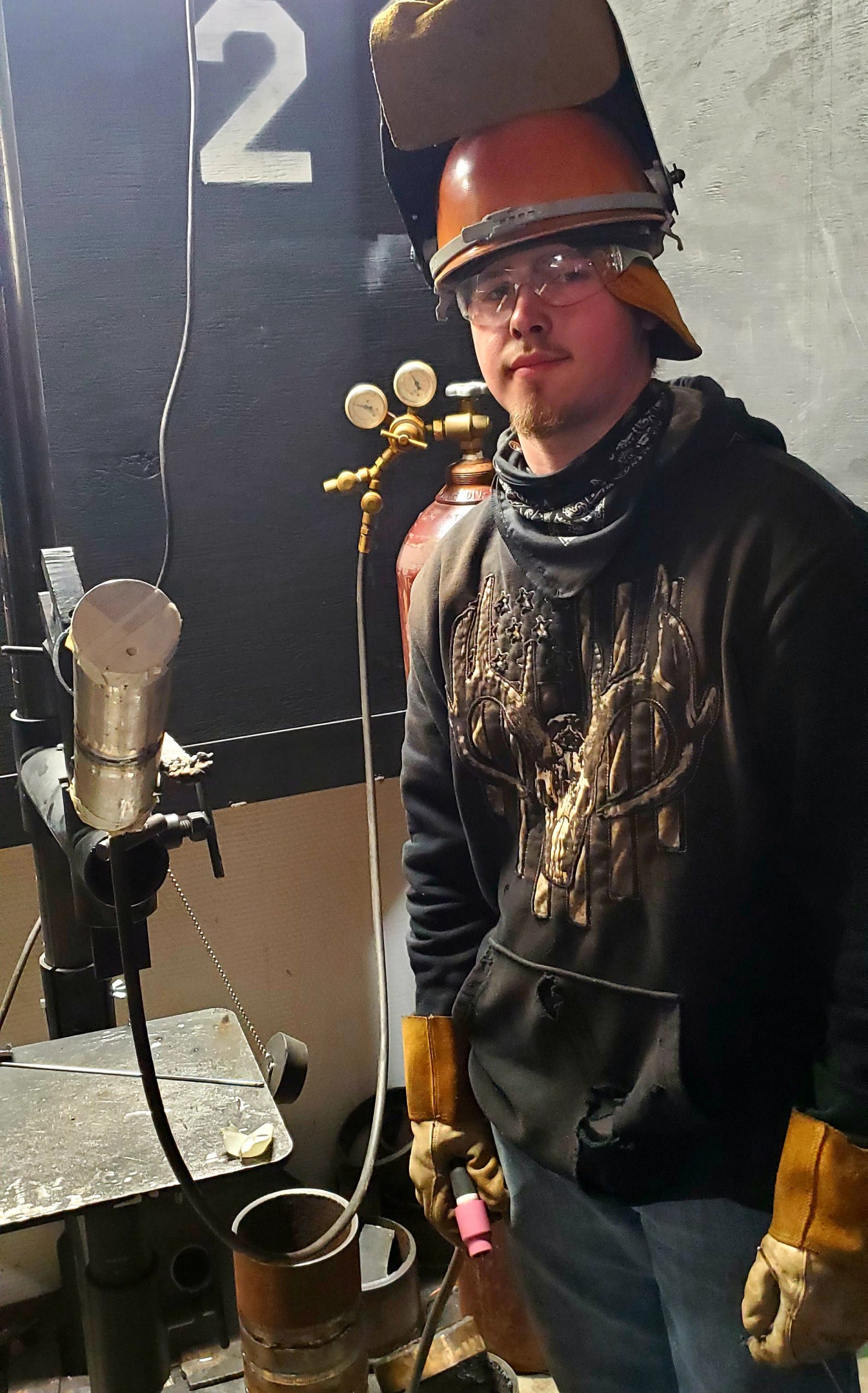 Man in welding helmet