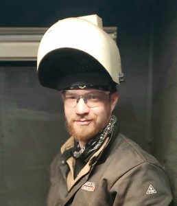 Man in welding gear