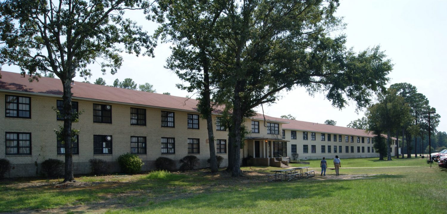 building with trees in front