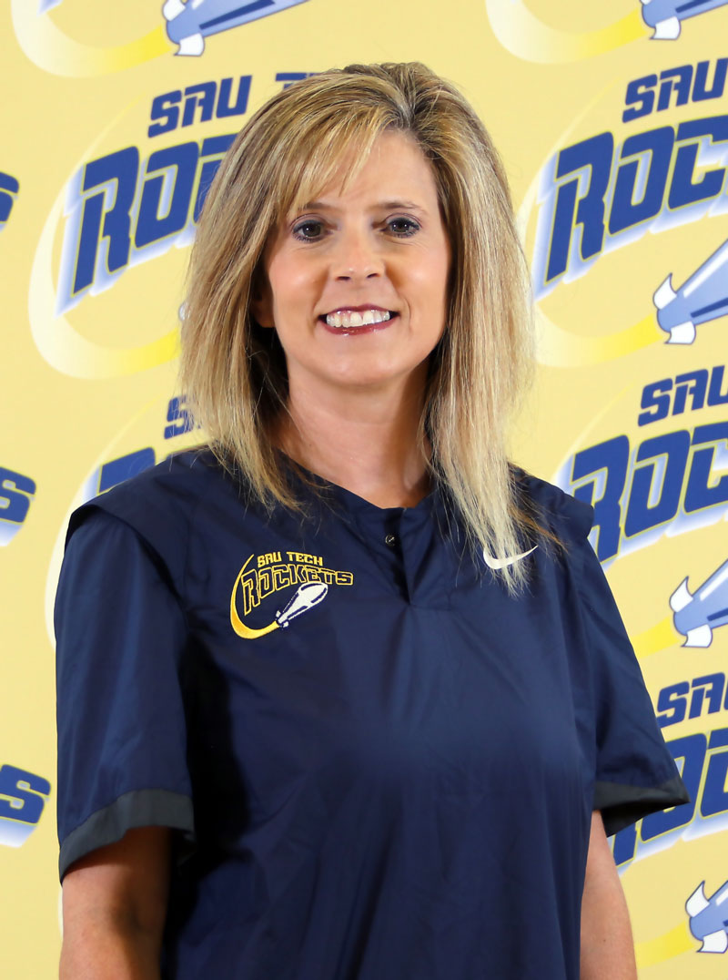 blond woman in a navy blue shirt