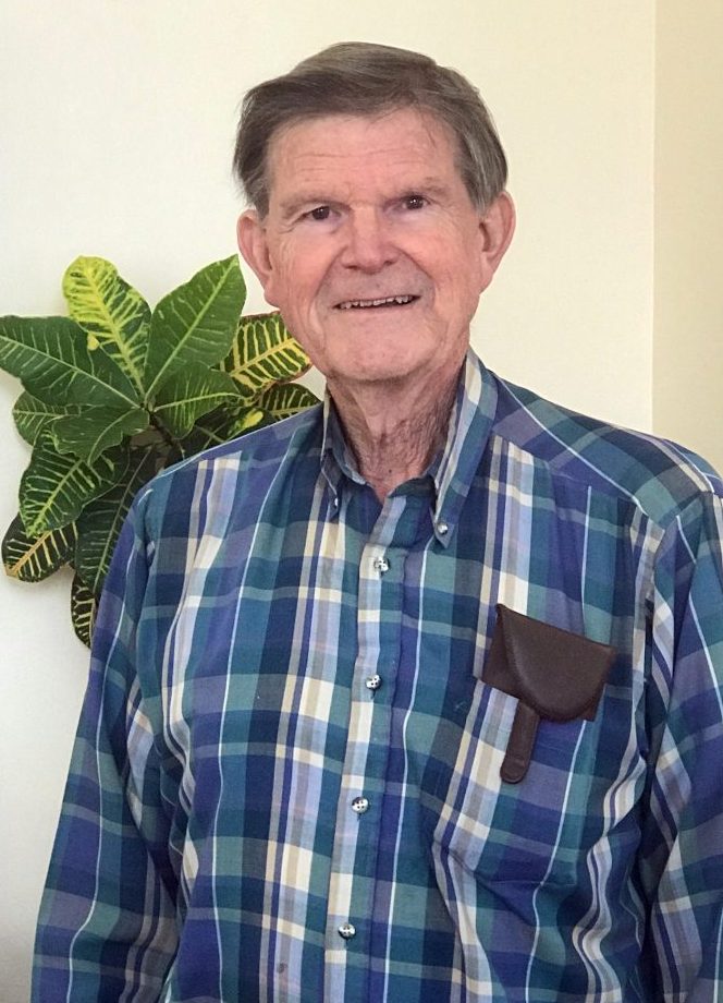 man in plaid shirt with gray hair