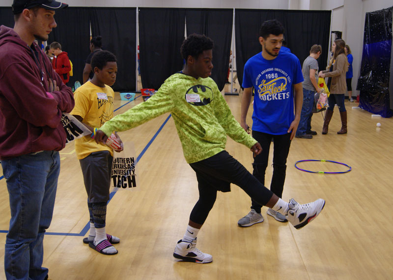 scholars helping students