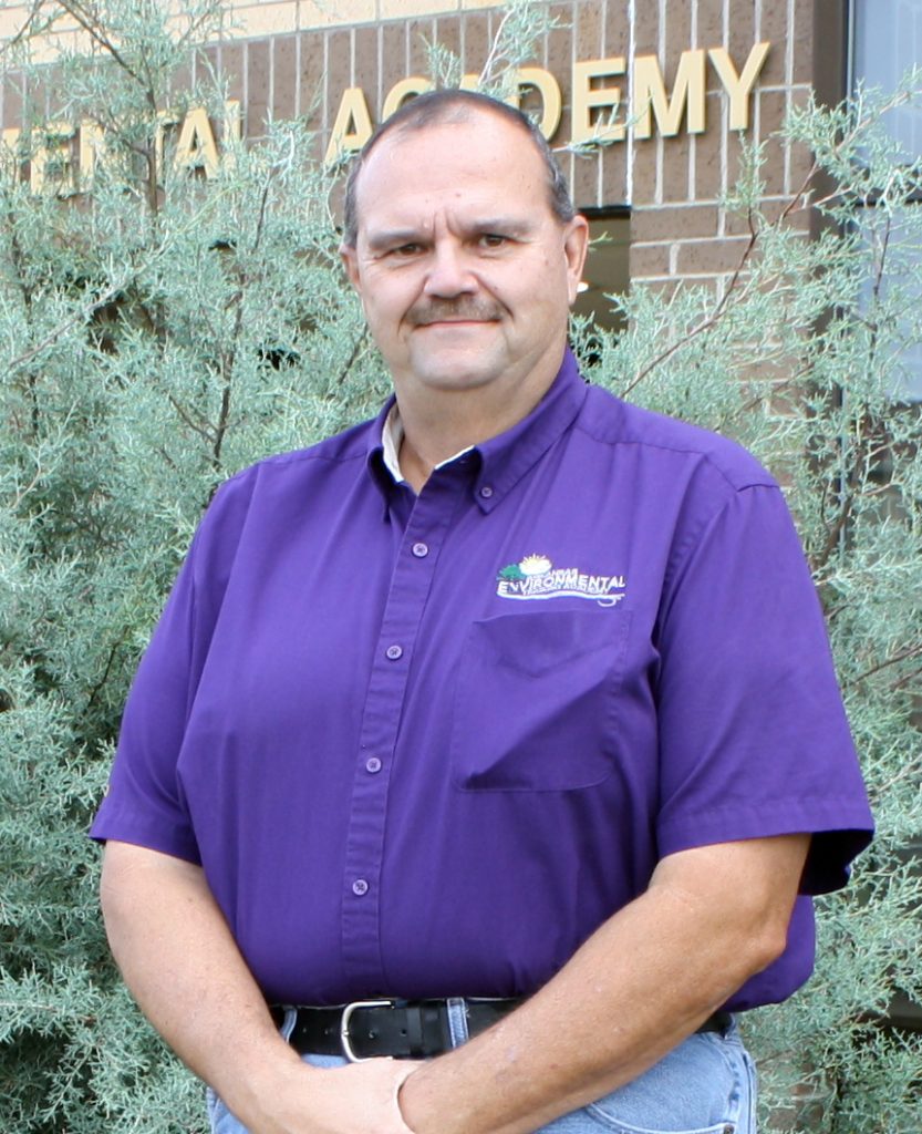 man in purple shirt