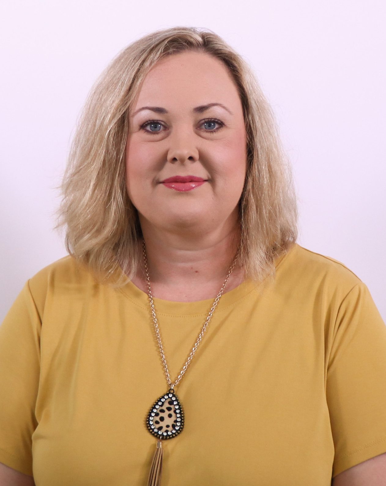 Woman in yellow blouse