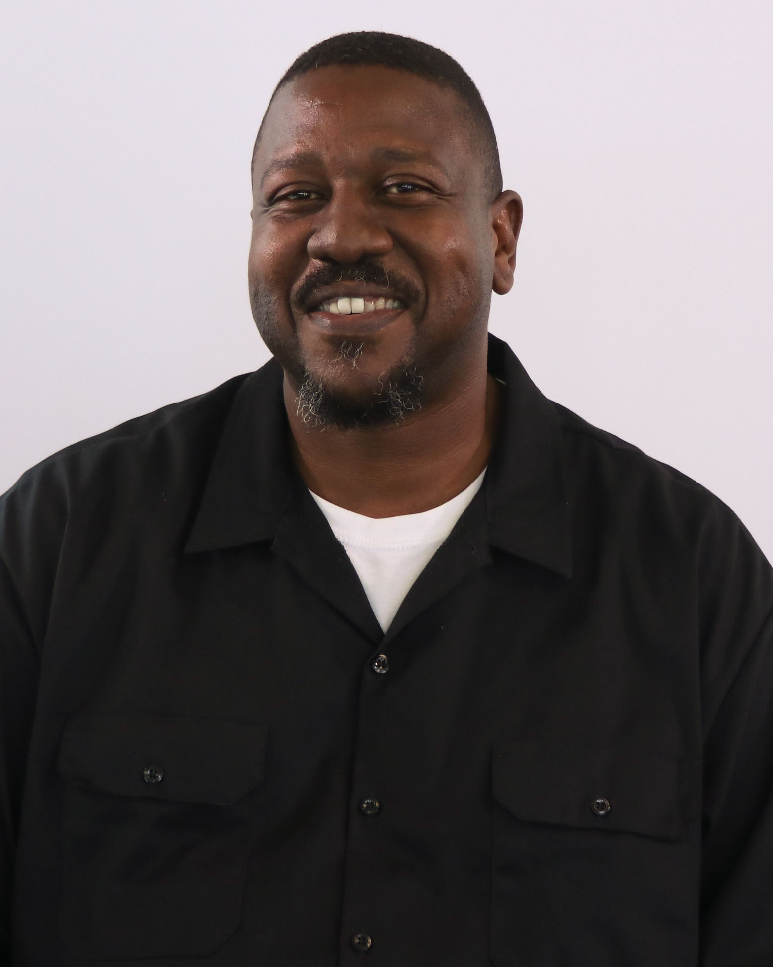 black male with blue shirt