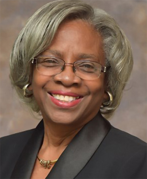 Smiling woman with pink lipstick