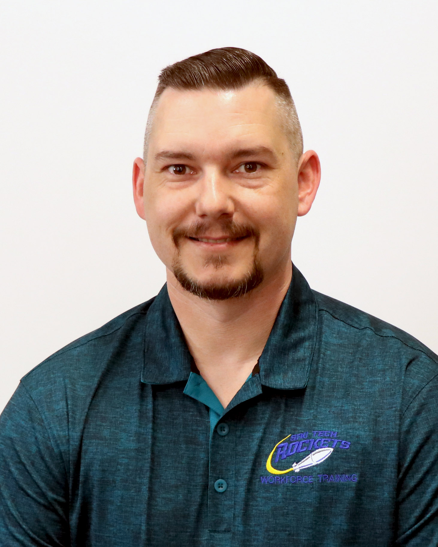 Smiling caucasian man in polo shirt